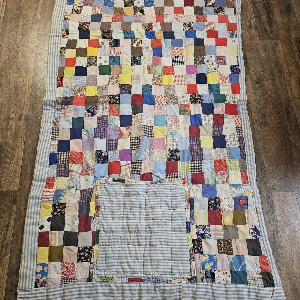 Patchwork Quilt with Multicolor Squares that Folds Into Pillow 42x69